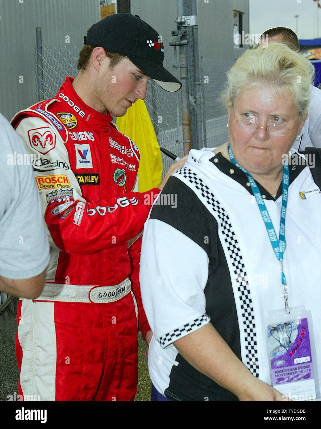 NASCAR Nextel Cup driver Kasey Kahne signs Connie Logue's shirt, in the garage area at the Homestead-Miami Speedway, in Homestead,  Florida on November 18, 2005.  (UPI Photo/Michael Bush) Stock Photo