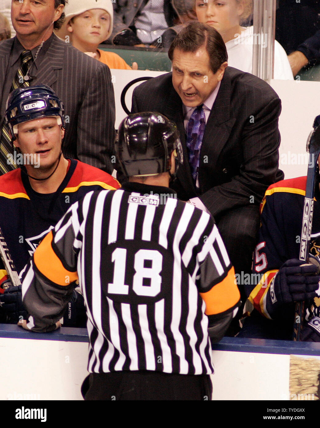 Florida Panthers head coach Jacques Martin argues a call with Referee Greg Kimmerly during the overtime period, at the Bank Atlantic Center, in Sunrise,  Florida, on December 26, 2005.  (UPI Photo/Michael Bush) Stock Photo