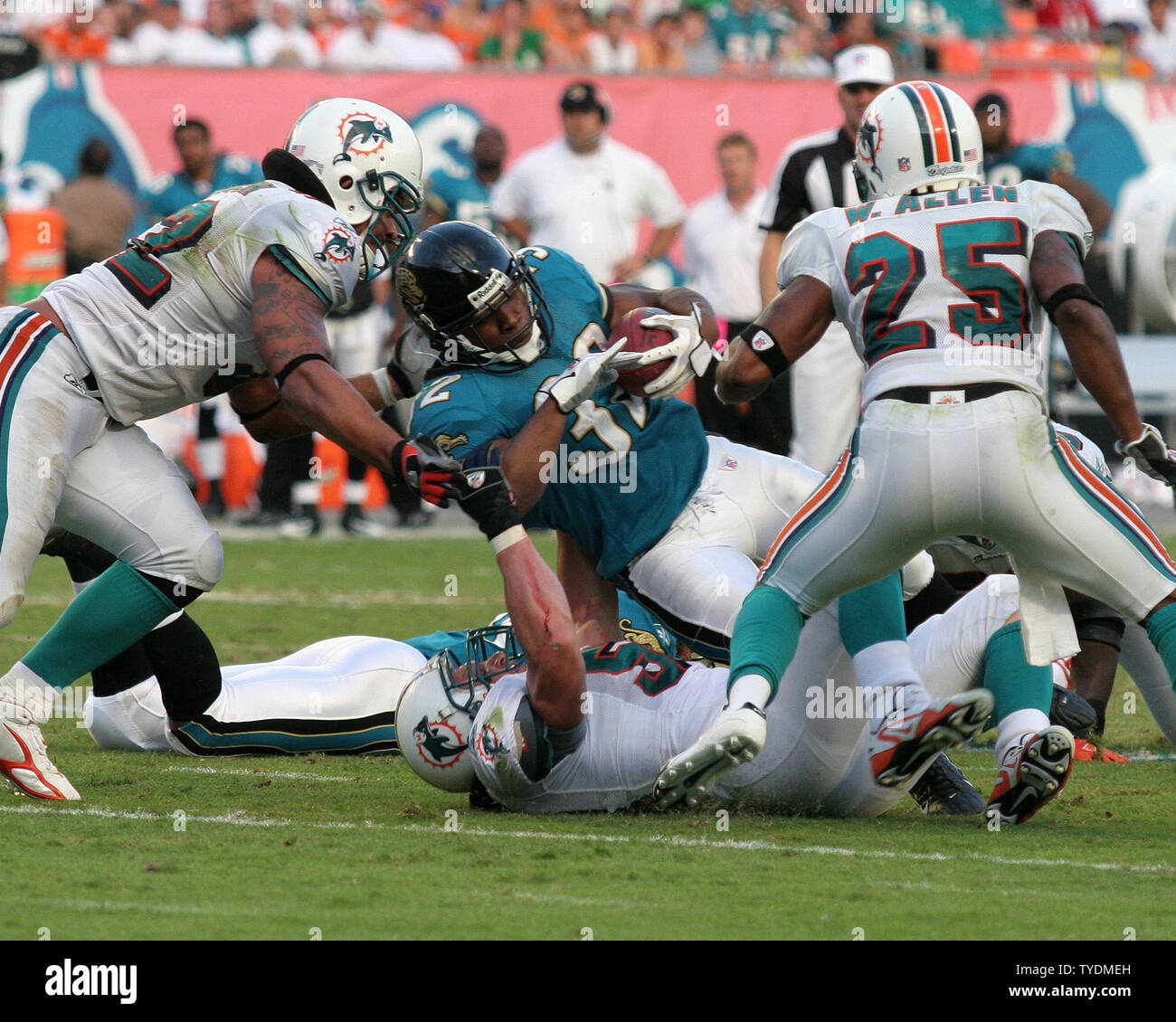 MIAMI GARDENS, FL - OCTOBER 20: Daniel Thomas #33 of the Miami Dolphins  rushes during a game against the Buffa…