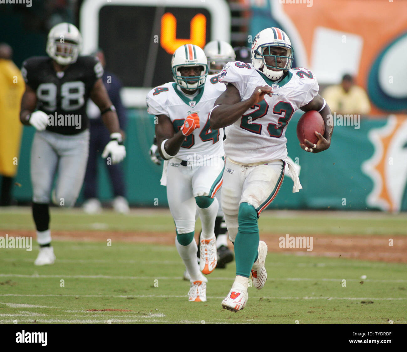 Miami Dolphins running back Ronnie Brown (23) breaks this second quarter  run for 60 yards against the Oakland Raiders at Dolphin Stadium in Miami on  September 30, 2007. The Raiders defeated the