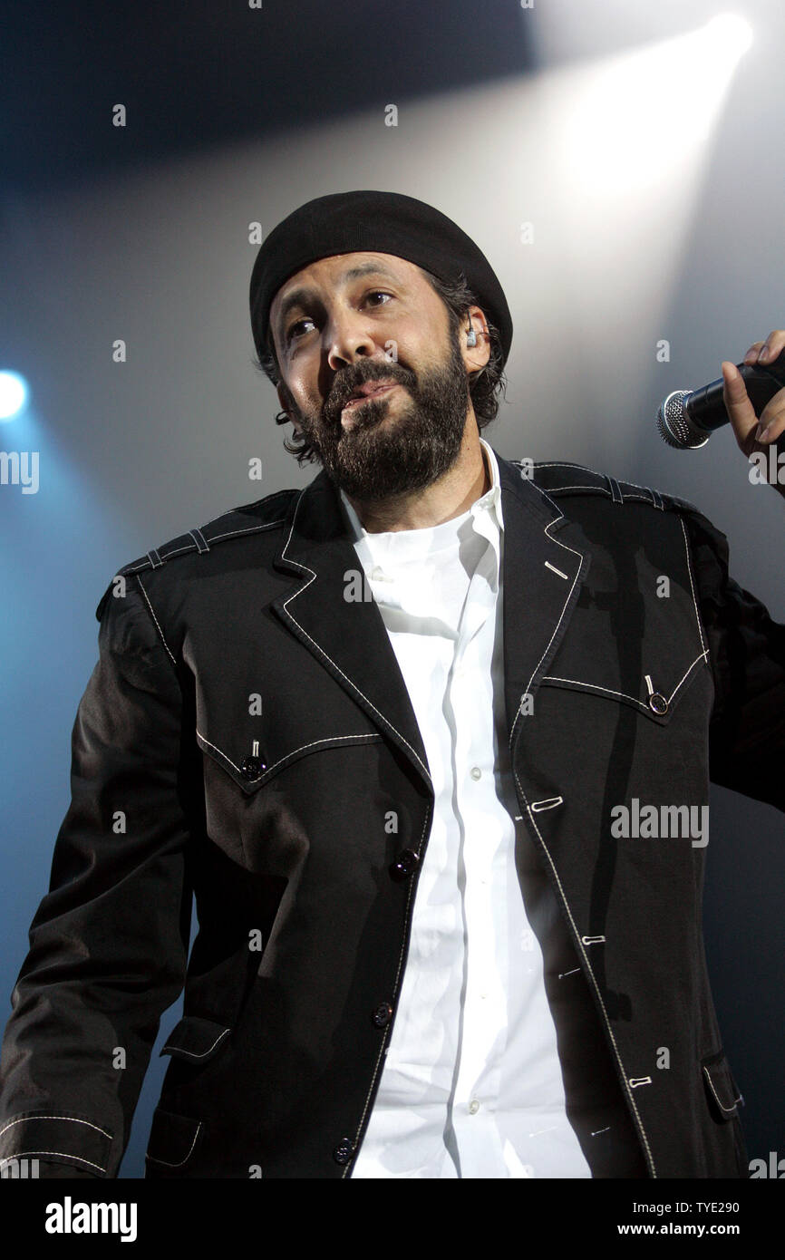 Dominican salsa artist Juan Luis Guerra performs in concert at the