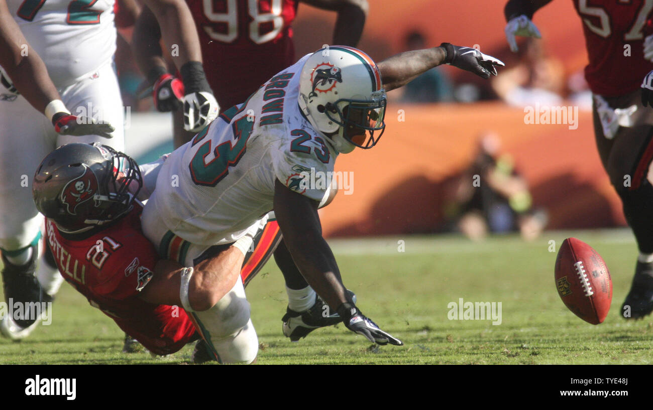 Miami Dolphins quarterback Pat White is taken off the field after a brutal  hit leaves him unconscious on the field for eight minutes. White was taken  to the hospital for further evaluations.