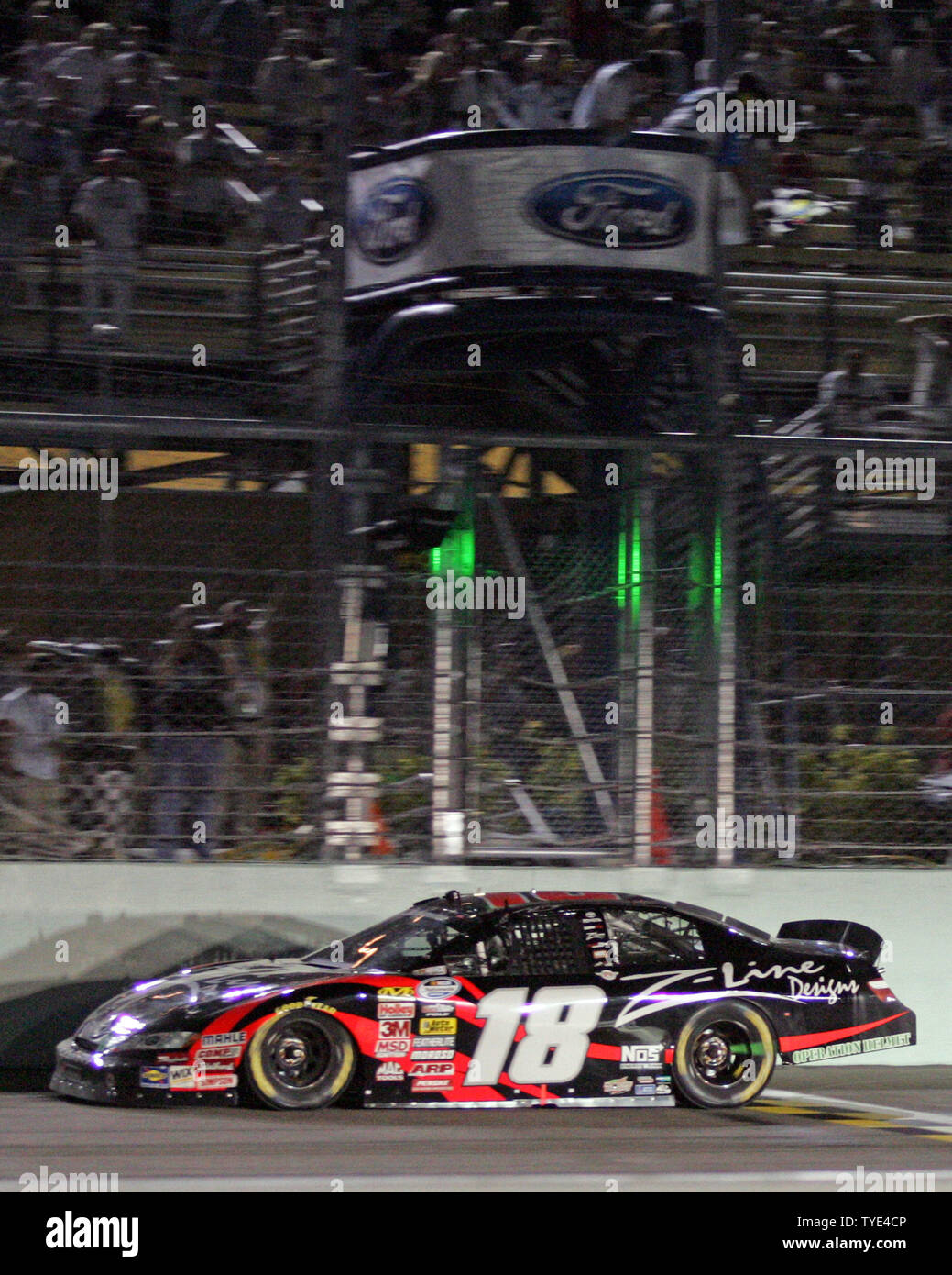 Kyle Busch takes the checkered flag and to win the NASCAR Nationwide