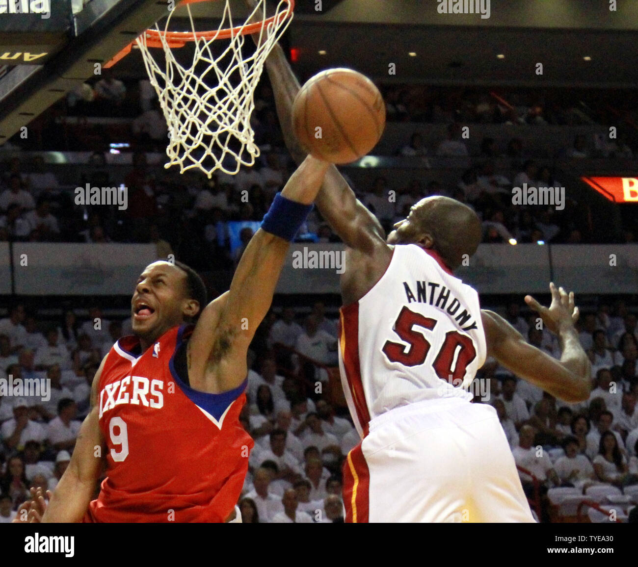 Miami Heat center Joel Anthony (50) blocks Philadelphia 76ers Forward Andre Iguodala  during game 2 of the first round of the Eastern Conference Playoff Series. First half action against the Philadelphia 76ers at the American Airlines Arena, in Miami, Florida April 18th, 2011. .The Miami Heat beat the Philadelphia 76ers 94-73..                                                    UPI/Susan Knowles... Stock Photo