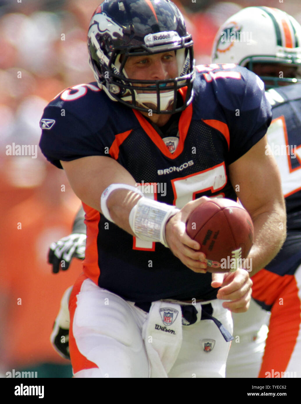 Denver Broncos quarterback Tim Tebow (15) runs during an NFL football game  between the Denver Broncos and the New York Jets Thursday, Nov. 17, 2011,  in Denver. (AP Photo/Jack Dempsey Stock Photo - Alamy