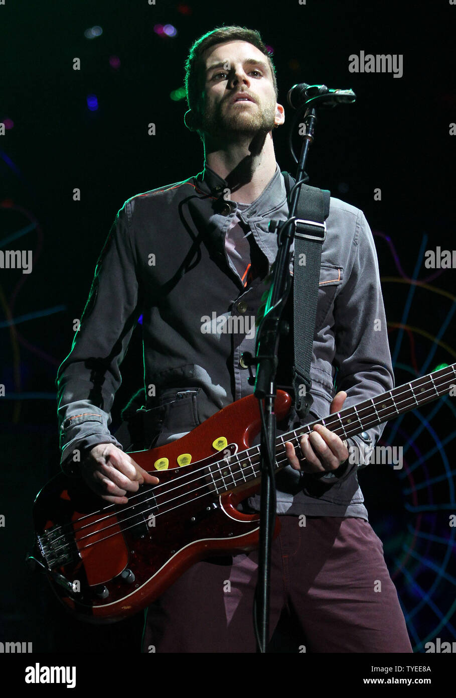 Guy Berryman with Coldplay performs in concert on their Mylo Xyloto tour 2012 at the American Airlines Arena in Miami on June 29, 2012. UPI/Michael Bush Stock Photo