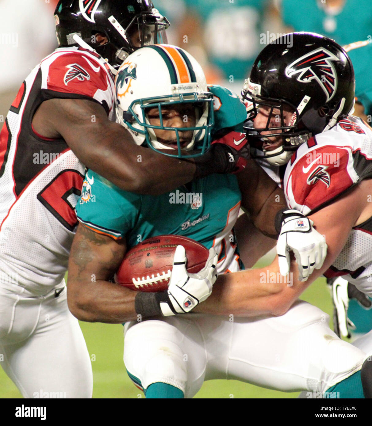 Miami Dolphins RB Reggie Bush (24) is tackled during first half