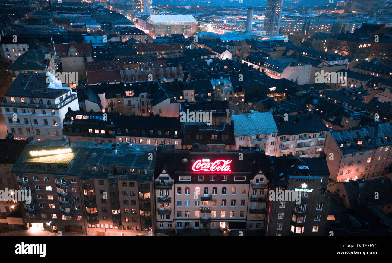 Roof tops with neon advertisements on Södermalm, Stockholm Stock Photo