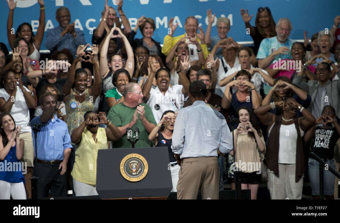 President Barack Obama enters arena before delivering remarks during the last stop of his Florida bus tour to grassroots  supporters  at the Palm Beach County Convention Center, West Palm Beach, Florida on September 09, 2012.  President Obama discussed what’s at stake for middle class families in this election along with his plan to continue to restore middle-class security by paying down our debt. UPI/Gary I Rothstein. Stock Photo