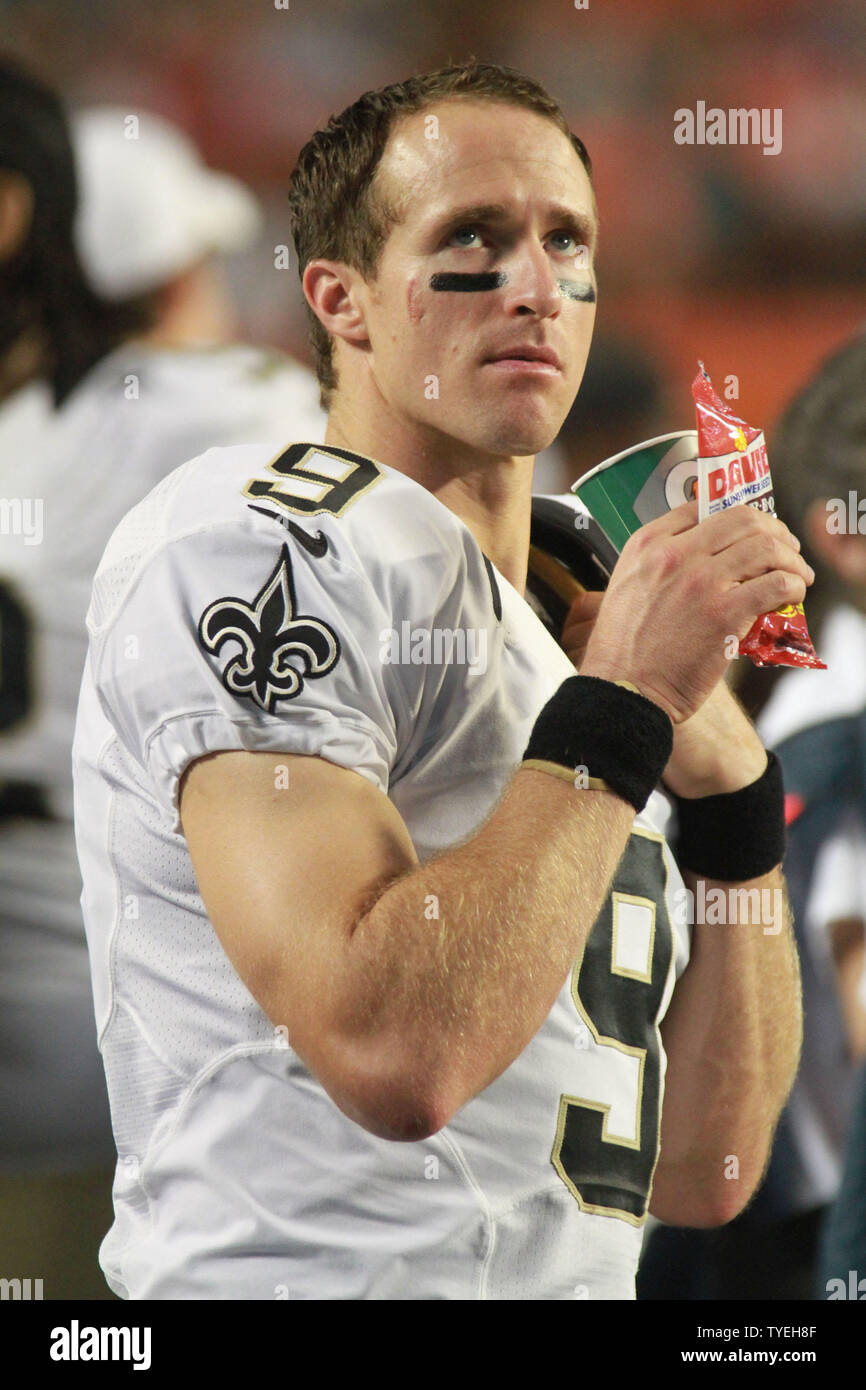 New Orleans Saints QB Drew Brees watches from the sidelines during the first half against the New Orleans Saints at Sun Life Stadium in Miami, Florida on August 29, 2013.          UPI/Susan Knowles Stock Photo