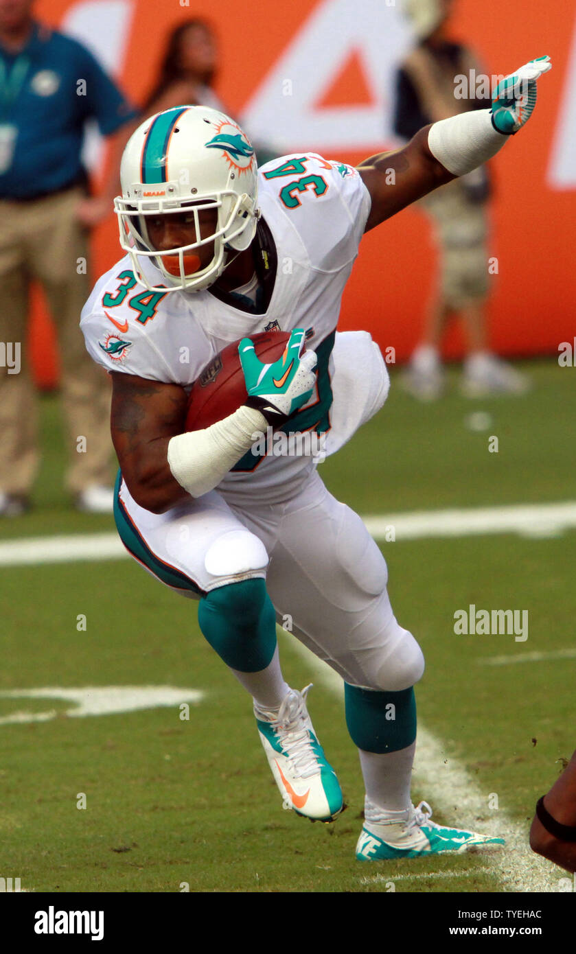 Miami Dolphins RB Marcus Thigpen looks for room to run against The Atlanta Falcons                            during the first half at Sun Life Stadium in Miami, Florida on September 22, 2013.  .                                UPI/Susan Knowles Stock Photo