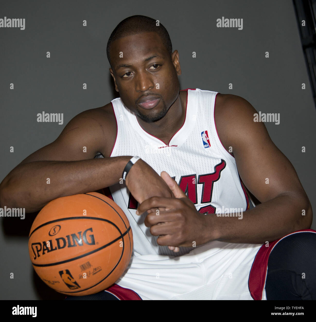 Miami Heat's Dwyane Wade (3) poses for a photo during the team's media day at the American Airlines Arena in Miami, Florida on September 30, 2013.  UPI/Gary I Rothstein Stock Photo