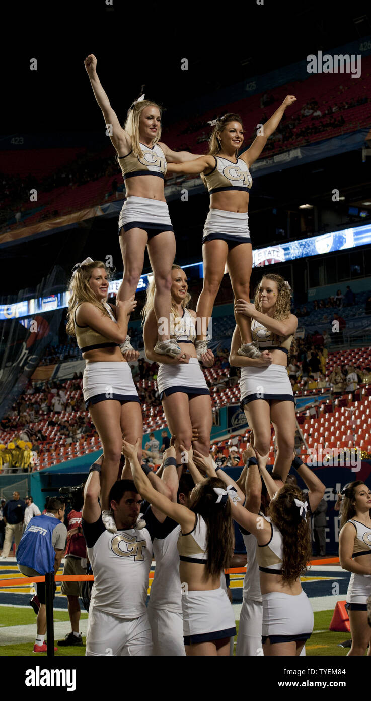 Tech cheerleaders perform after the Yellow Jackets score during