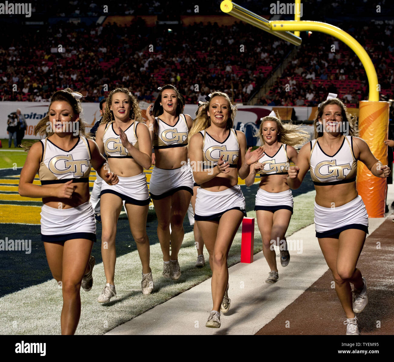 Tech cheerleaders perform during the 2014 Orange Bowl at Sun