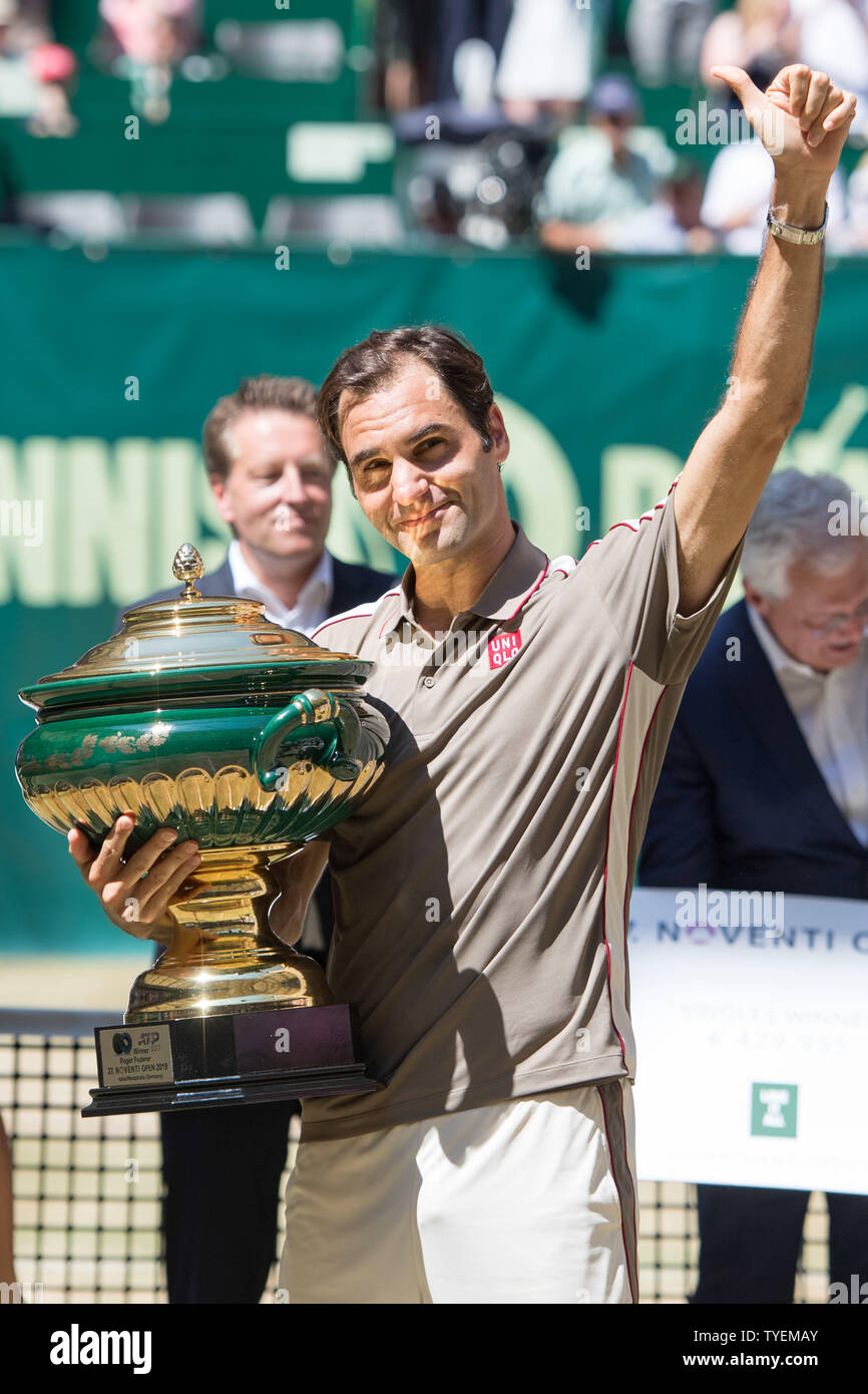 Roger FEDERER (SUI) wins the ATP tournament in Halle for the tenth time,  cheering with trophy, trophy, trophy, jubilation, cheering, cheering, joy,  cheers, celebrate, final jubilation, half figure, half figure, 10th,  portrait,