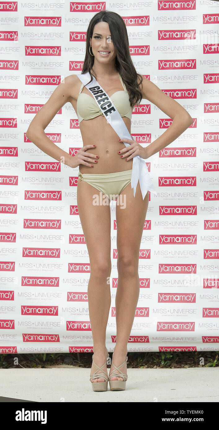 Miss Universe contestant Ismini Dafopulou from Greece models a selection  from the Yamamay swimsuit collection during the swimsuit runway event at  Trump National Doral pool in Miami, Fl orida on January 14,