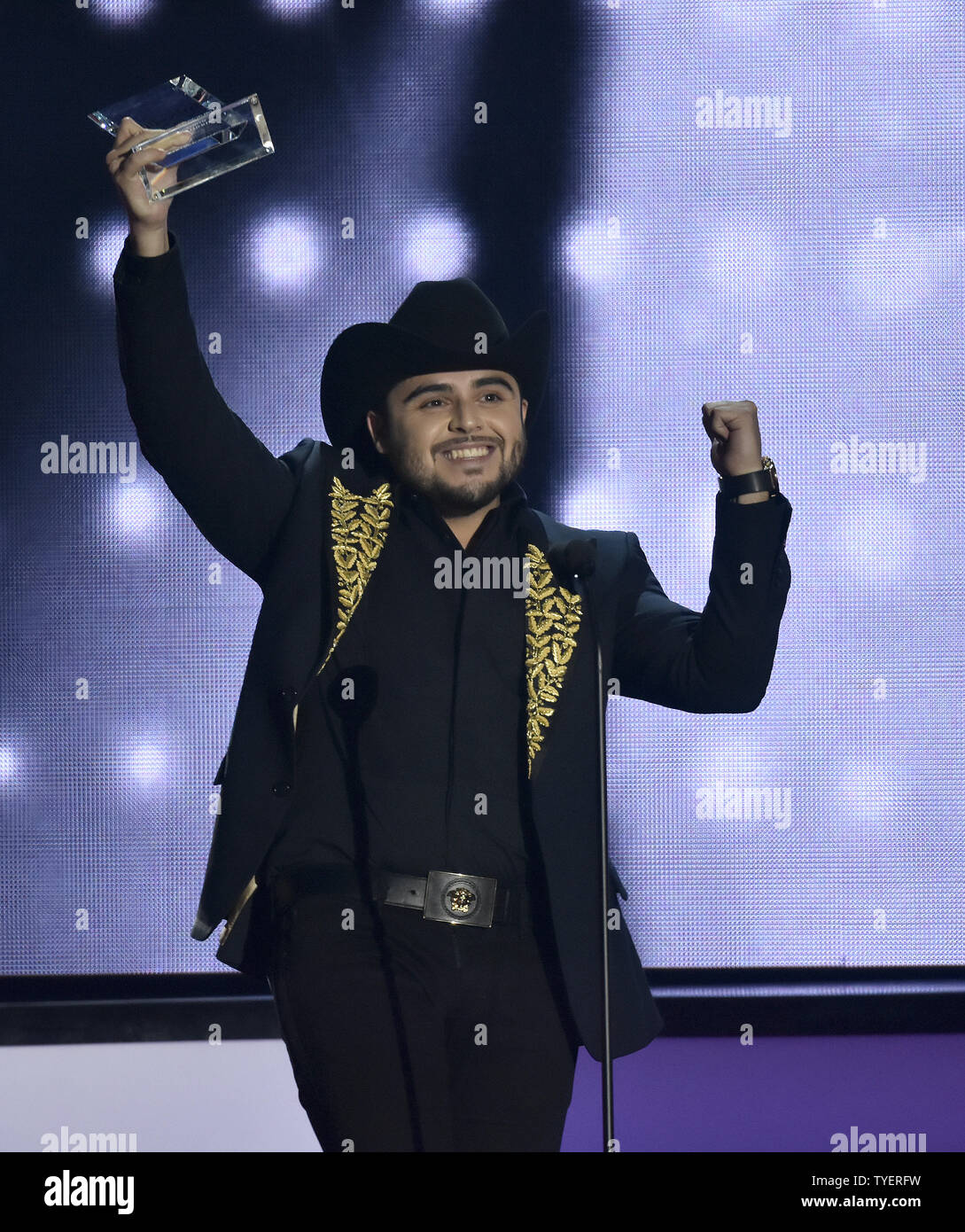 Geraldo Latin Rapper Latin artist Gerardo Ortiz holds is award at the 2016 Billboard Latin ...