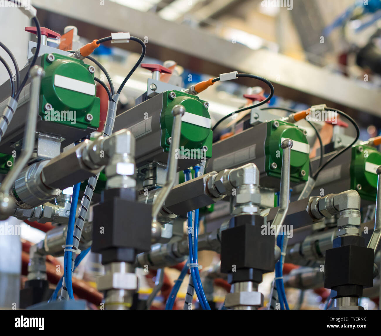 Automatic hydraulic industrial injection valve system Stock Photo - Alamy