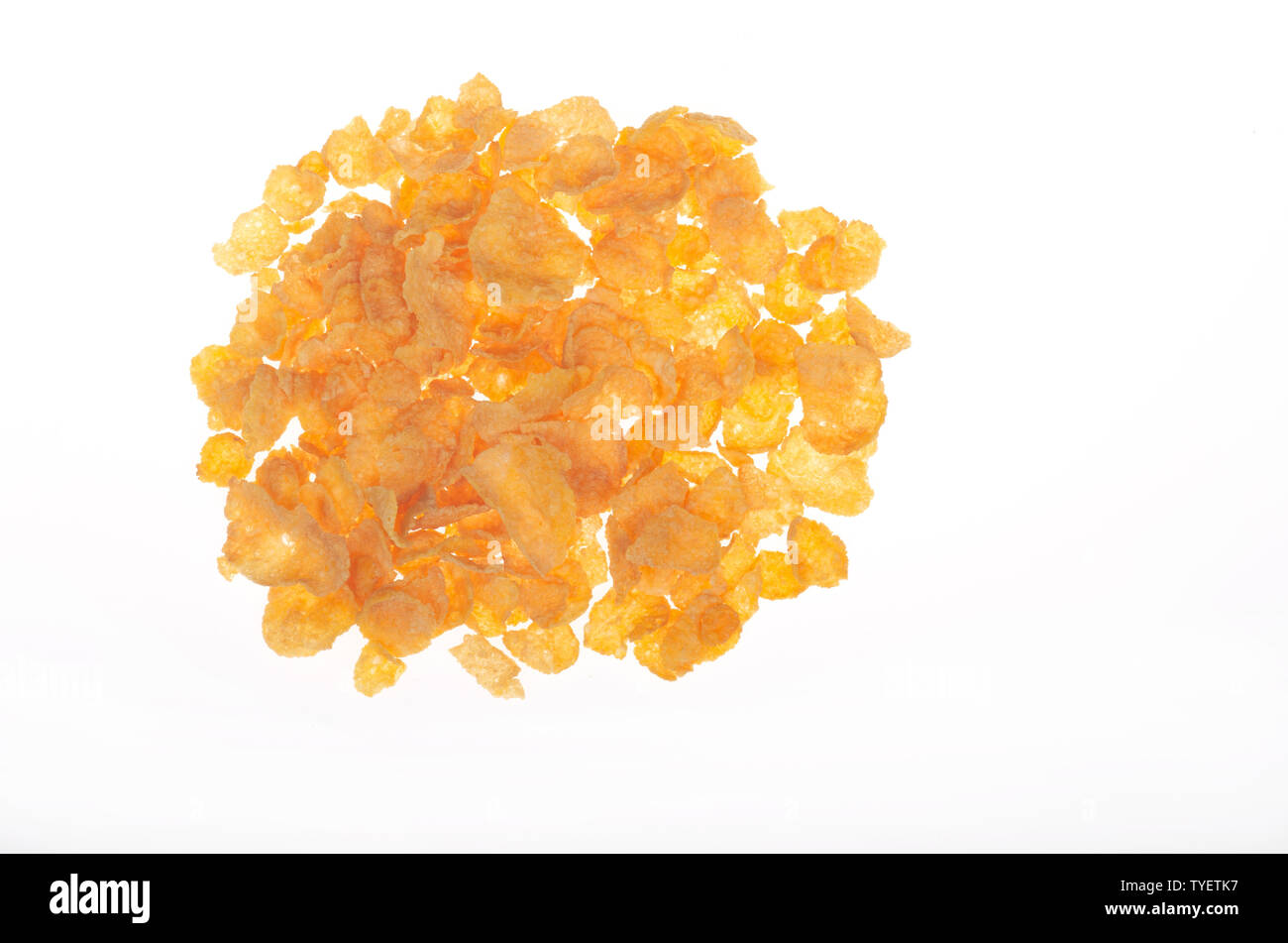 Looking down at Kellogg's Corn Flakes cereal on white Stock Photo