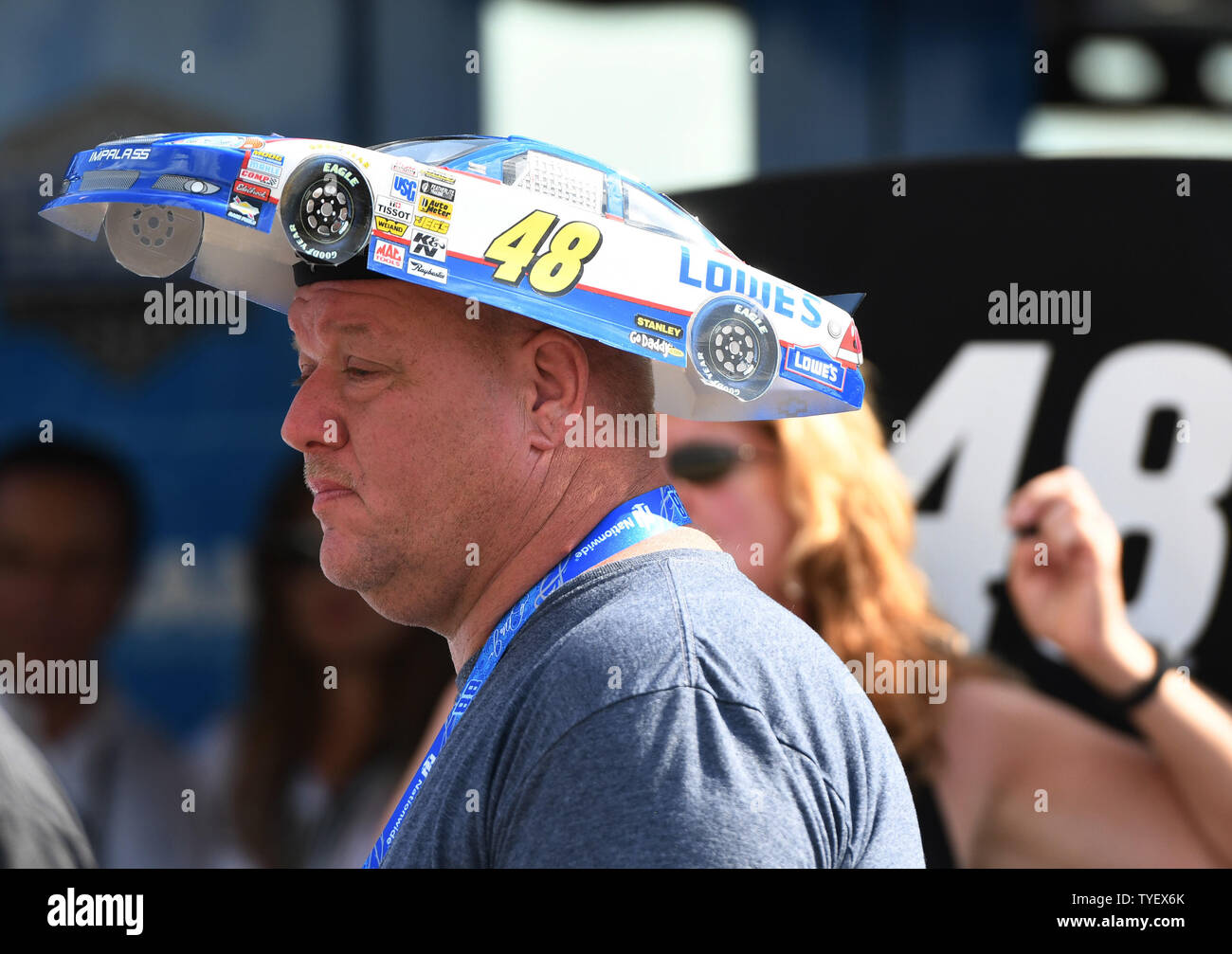 Mike Waterman a NASCAR Nationwide Series Championship fan of driver Jimmy Johnson (48)  is seen wearing c car hat during his final practice laps before the Ford EcoBoost 400 at the Homestead-Miami Speedway in Homestead, Florida on November 19, 2016. The ECOBOOST 400 will be run on Unday, November 20, 2016 at the Homestead-Miami Raceway.  Photo By Gary I Rothstein/UPI Stock Photo