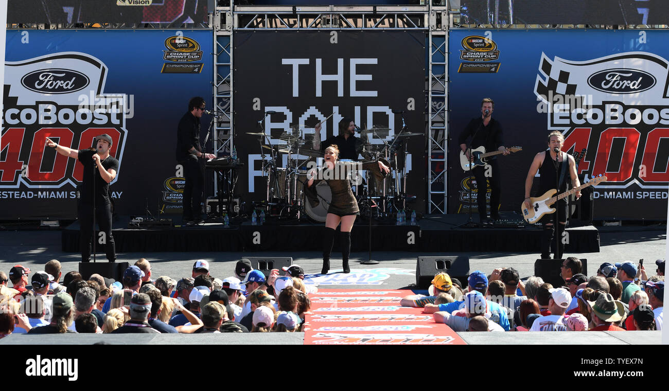 Kimberley Perry (C) and the Band Perry are seen performing the pre-race ...