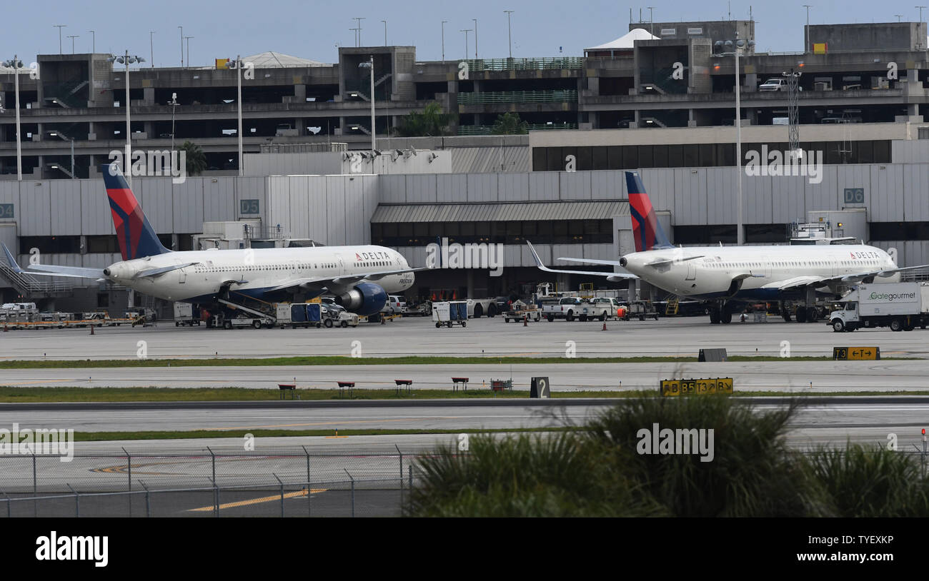Two Delta jets sit docked at terminal 2 at Fort Lauderdale airport