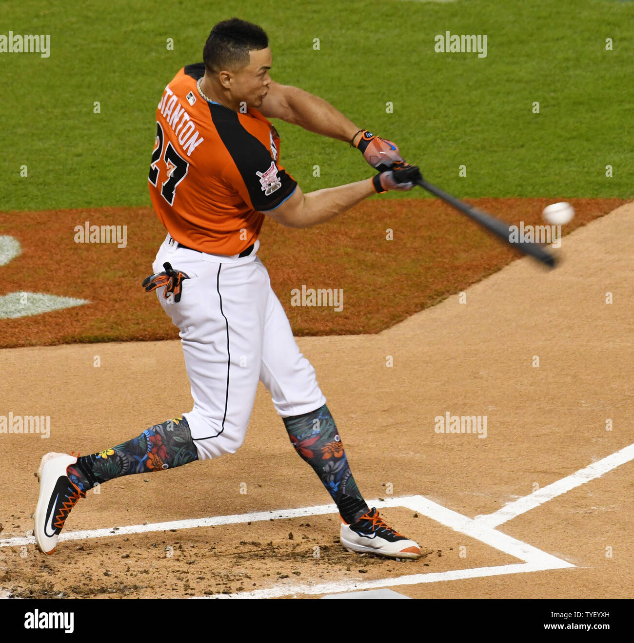 Miami Marlins Giancarlo Stanton hits a home run in the first round of the  2017 MLB home run derby at Marlins Park in Miami, Florida on July 10, 201.  New York Yankees