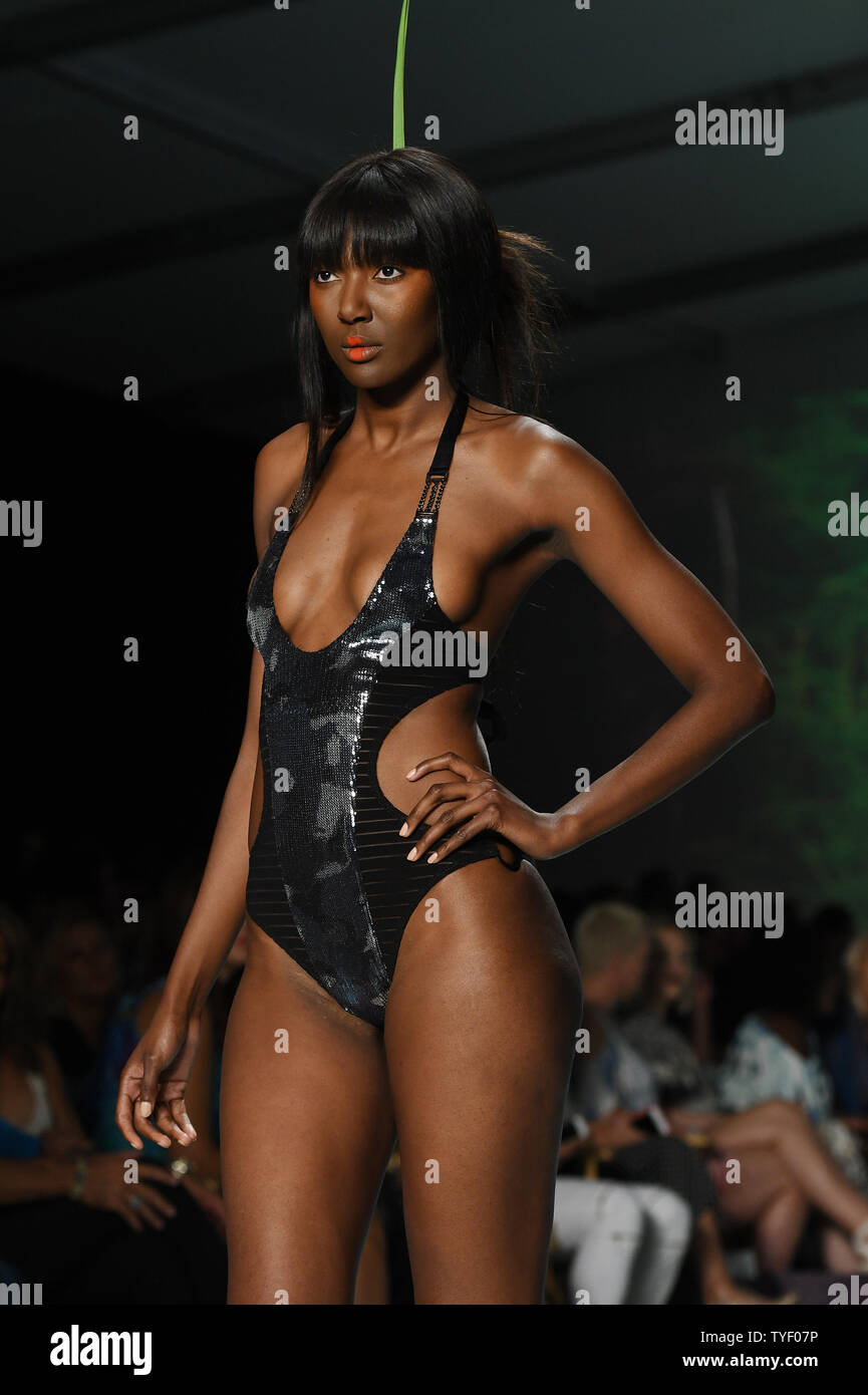 A runway model wears a swimsuit by designer XXX during the Funkshion Miami  Swim Week in Miami Beach, Florida, July 21, 2017. Photo by Gary I  Rothstein/UPI Stock Photo - Alamy