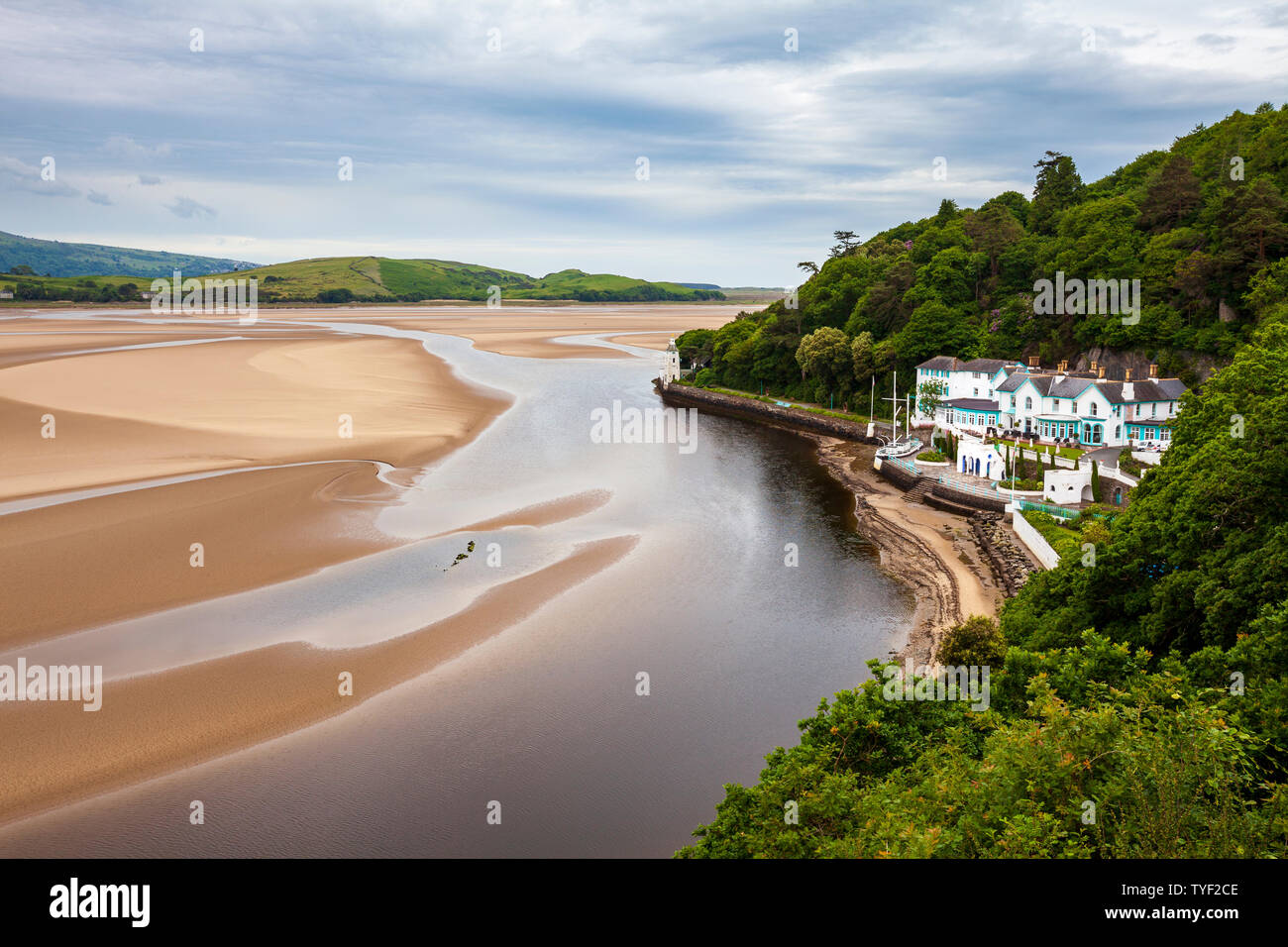 Landscape view of the Dwyryd Estuary and the Hotel and Stone Boat at Portmeirion during Low Tide, Wales Stock Photo