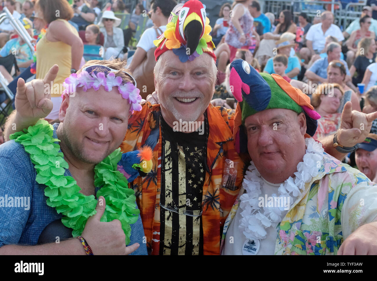 Fans of Jimmy Buffett and the Coral Reefer Band attend the concert at the  Hollywood Arts Park Amphitheater in Hollywood, Florida, on August 23, 2018.  The concert was to support Gwen Graham