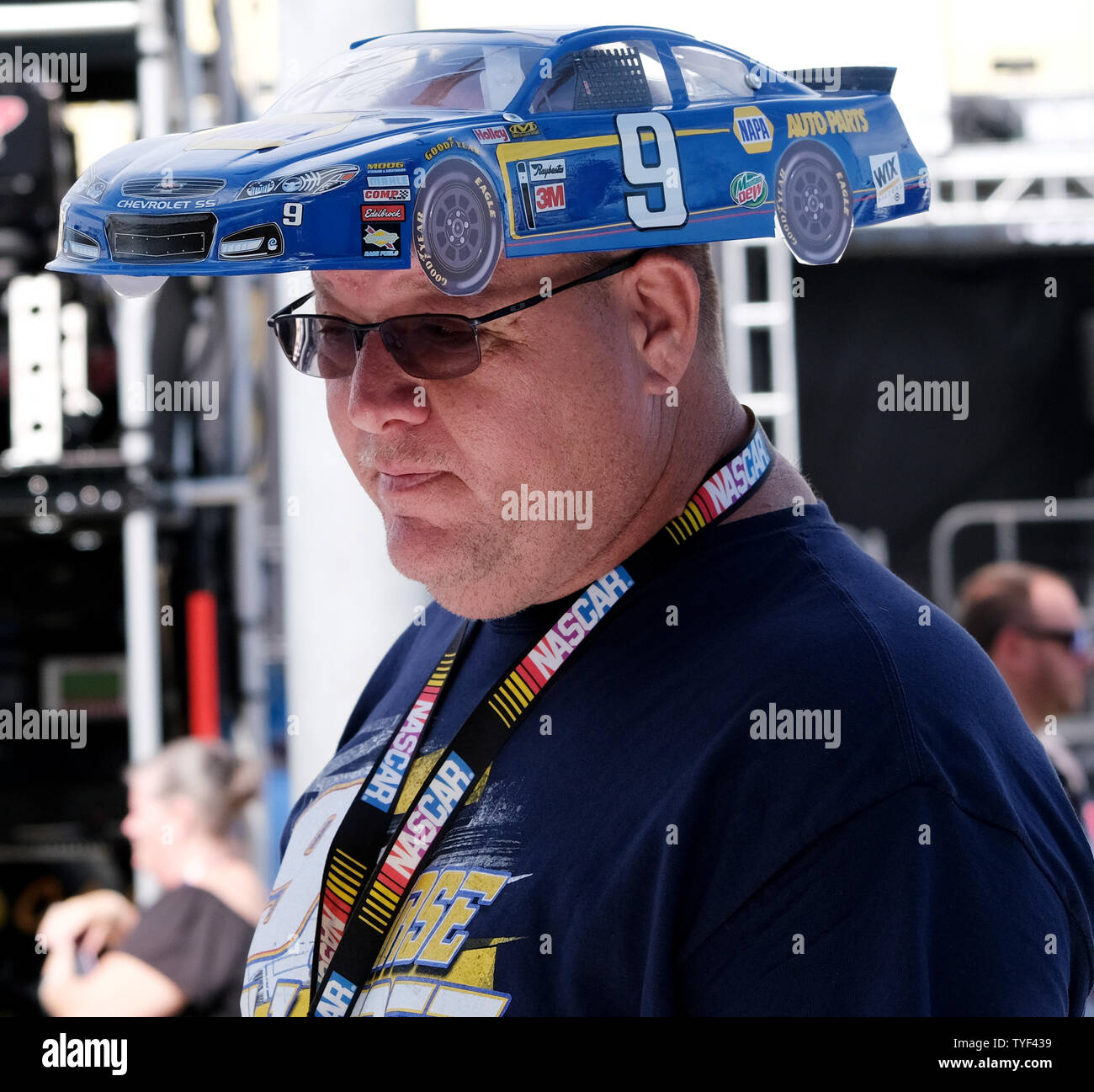 Race fan Mike Waterman wearing a  Chase Elliott (9) car hat walks in the pit area before the start of the NASCAR Cup Series Championship at Homestead-Miami Speedway in Homestead, Florida on November 18, 2018.  Photo By Gary I Rothstein/UPI Stock Photo