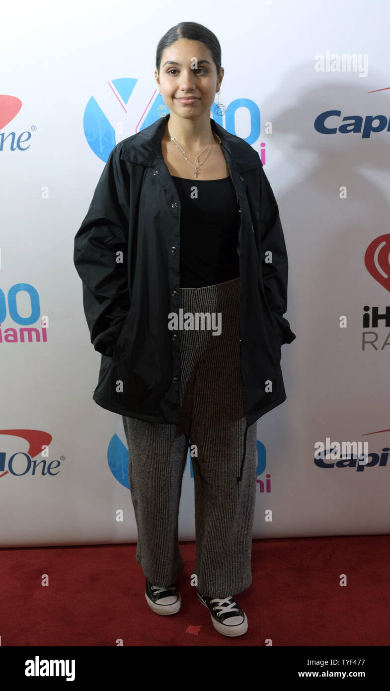 Alessia Cara walks the red carpet at the Y100 iHeartRadio Jingle Ball