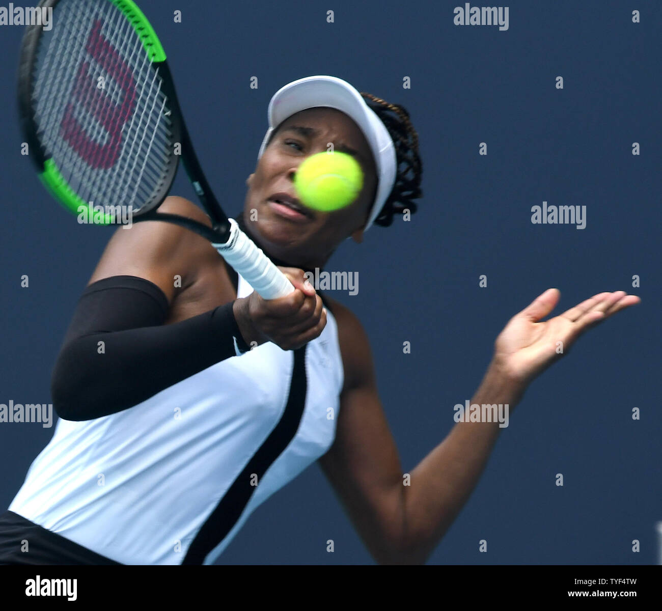 Venus Williams from the USA hits a forehand shat back to Dalila