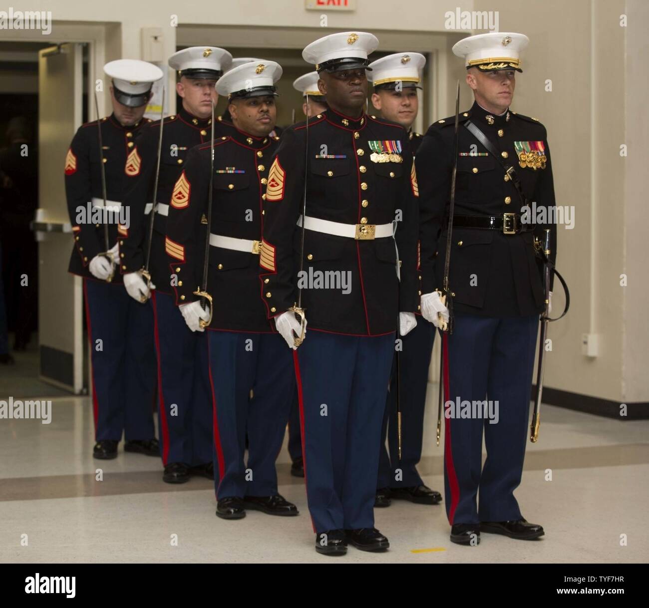 U.S. Marines with Headquarters and Headquarters Squadron (H&HS) stand at attention during presentation of colors at the H&HS Marine Corps Air Station New River 241st Marine Corps Birthday Ball, Crystal Coast Civic Center, Morehead City, N.C., Nov. 5, 2016. The Marine Corps has carred 241 years of traditions, values and standards since its establishment in 1775. Stock Photo