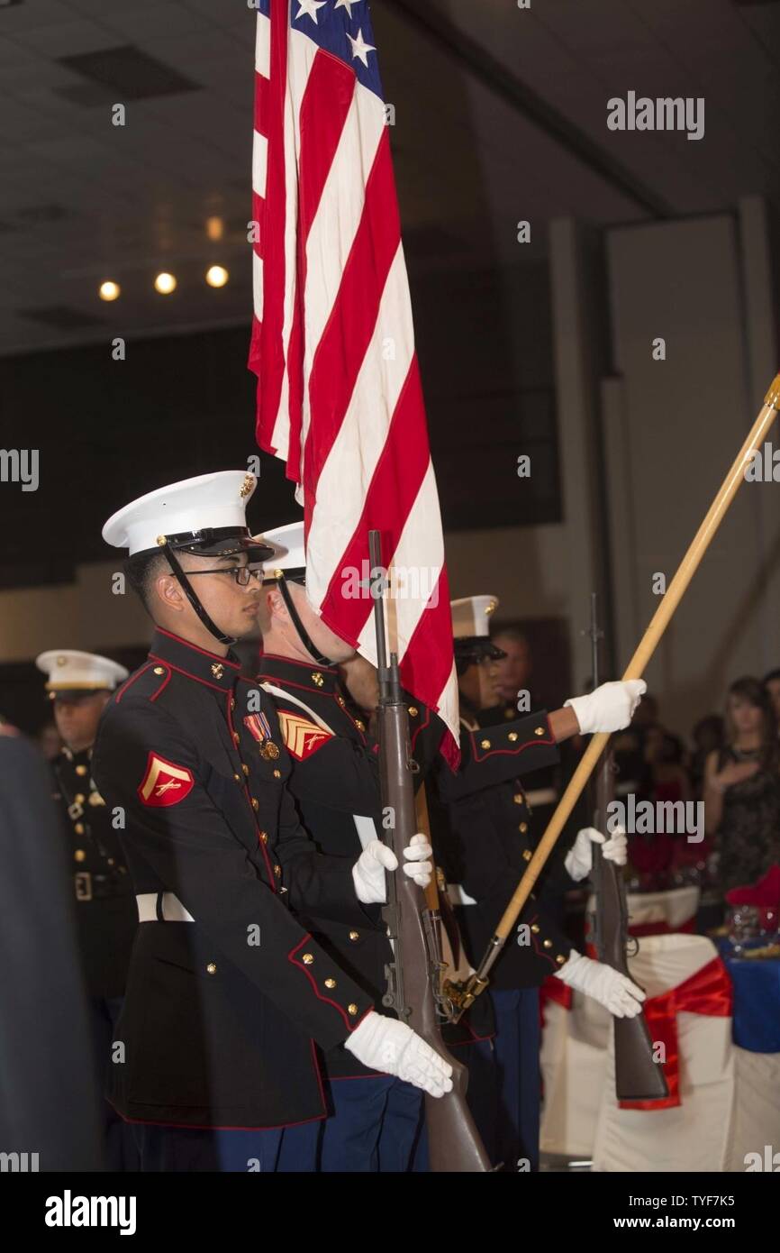 U.S. Marines with Headquarters and Headquarters Squadron (H&HS) present the colors during the H&HS Marine Corps Air Station New River 241st Marine Corps Birthday Ball at the Crystal Coast Civic Center, Morehead City, N.C., Nov. 5, 2016. The Marine Corps has carried 241 years of traditions, Values and standards since its establishment in 1775. Stock Photo
