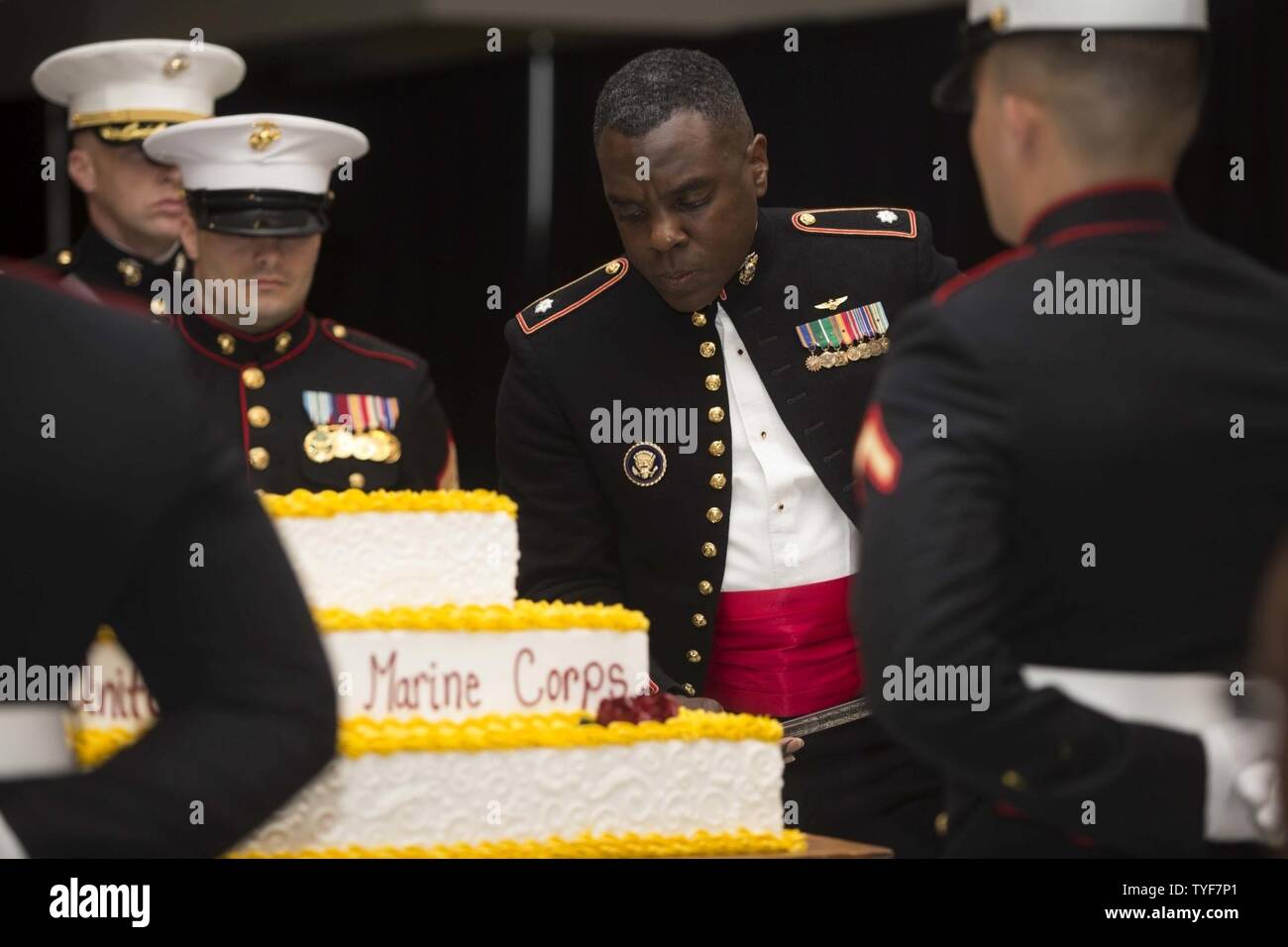 U.S. Marine Corps Lt. Col., Quentin Vaughn, commanding officer, Headquarters and Headquarters Squadron (H&HS), cuts the traditional  birthday cake during the H&HS Marine Corps Air Station New River 241st Marine Corps Birthday Ball at the Crystal Coast Civic Center, Morehead City, N.C., Nov. 5, 2016. The Marine Corps has carried 241 years of traditions, values and standards since its establishment in 1775. Stock Photo