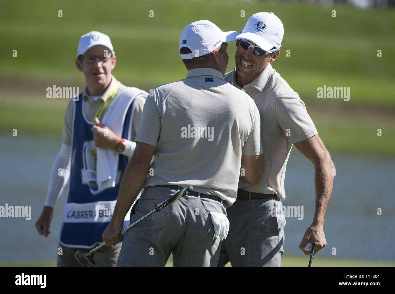 European team member Sergio Garcia (L) hugs Rafa Cabrera Bello celebrates after Bello made a putt on the 17th green on day 2 of the 2016 Ryder Cup at Hazeltine National Golf Club in Chaska, Minnesota on October 1, 2016. Photo by Kevin Dietsch/UPI Stock Photo