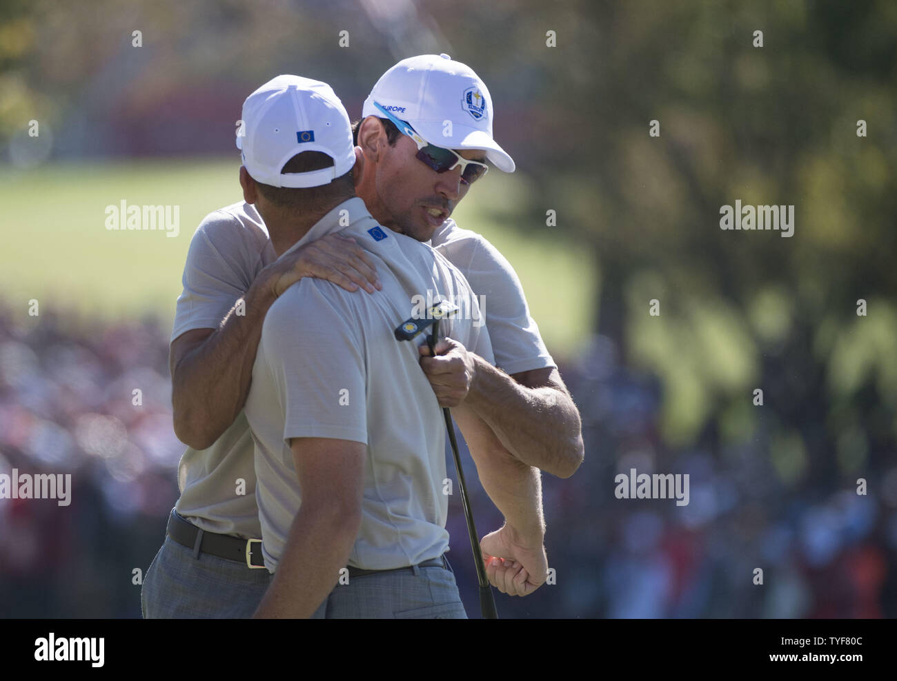 European team member Rafa Cabrera Bello (R) hugs Sergio Garcia after Garcia made a putt on the 16th green on day 2 of the 2016 Ryder Cup at Hazeltine National Golf Club in Chaska, Minnesota on October 1, 2016. Photo by Kevin Dietsch/UPI Stock Photo