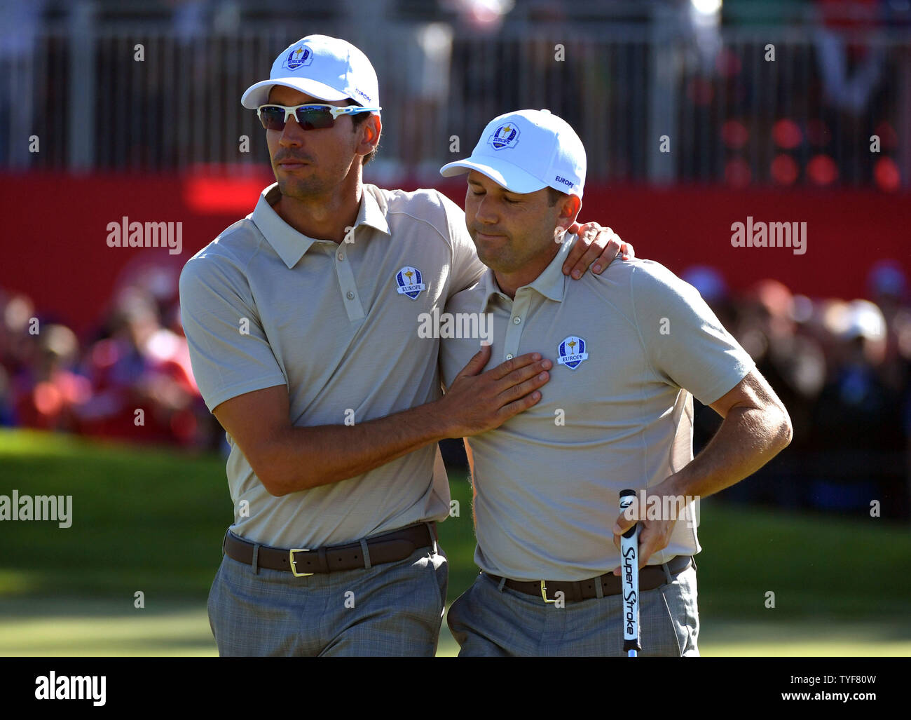 European team member Rafa Cabrera Bello consoles Sergio Garcia after he missed a putt on the 11th green during day 2 of the 2016 Ryder Cup at Hazeltine National Golf Club in Chaska, Minnesota on October 1, 2016. Photo by Kevin Dietsch/UPI Stock Photo