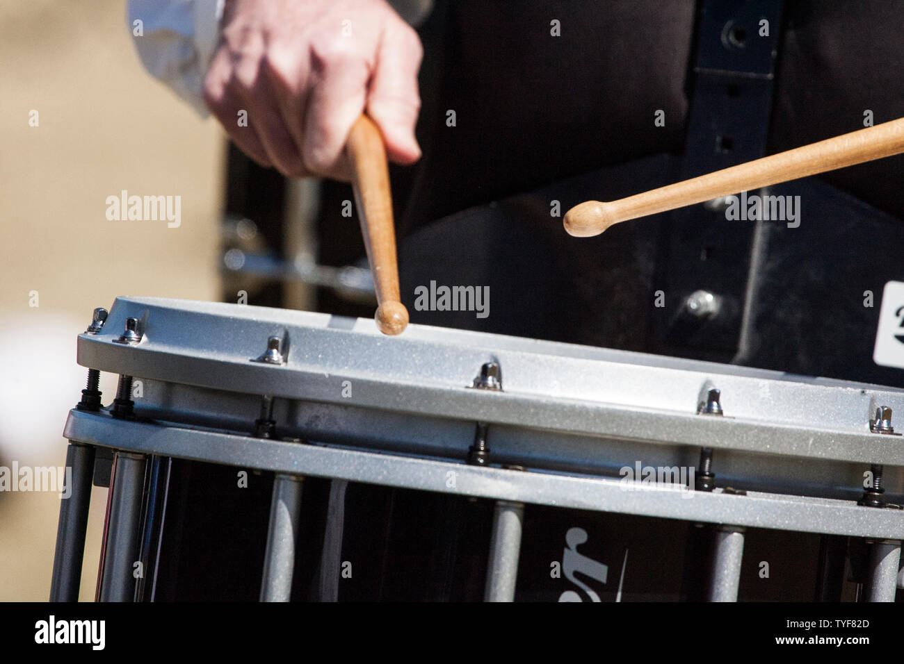 A drummer performs in a Scottish pipe and drum band Stock Photo
