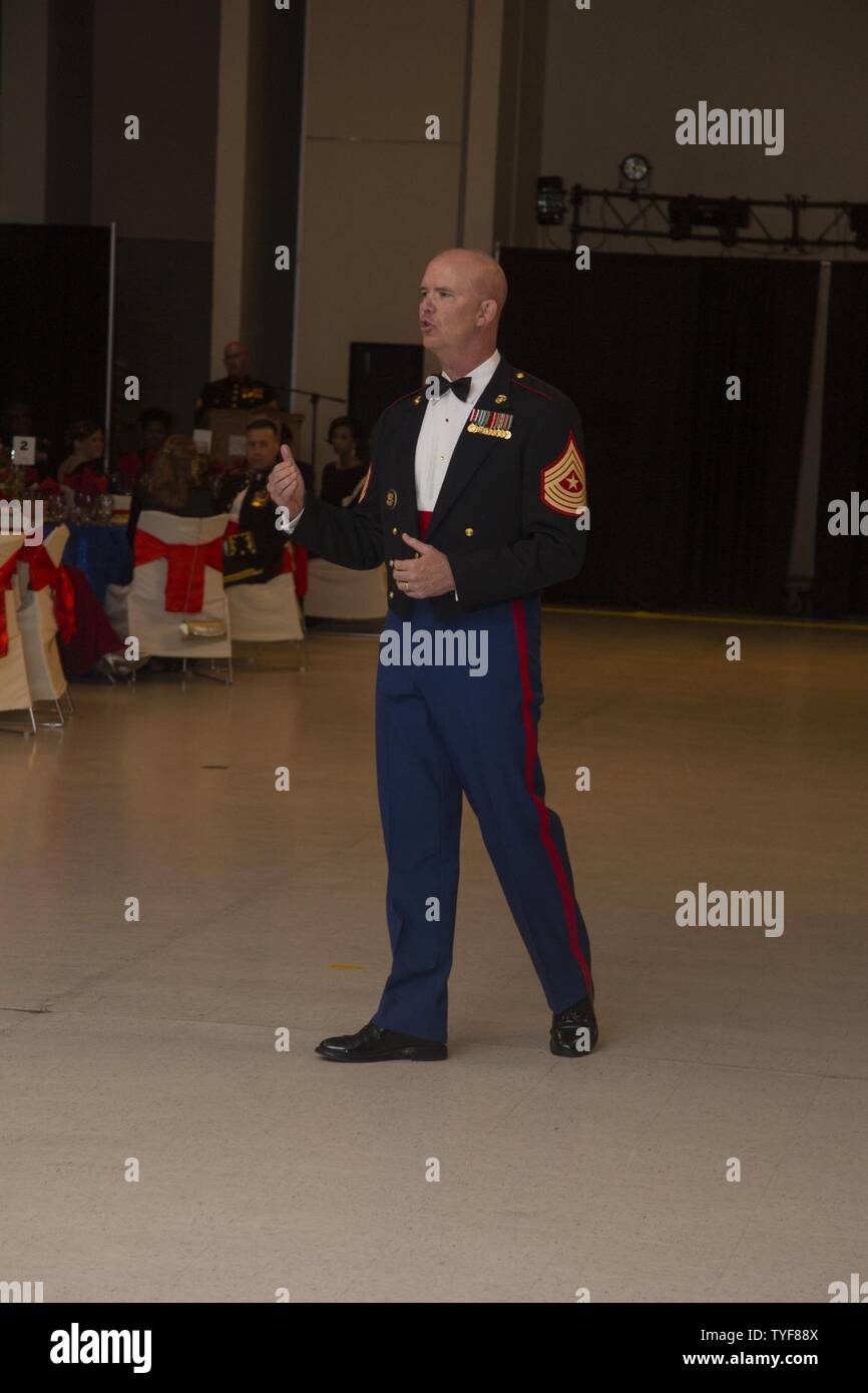 U.S. Marine Corps Sgt. Maj. Joseph Gray, sergeant major, Marine Barracks Washington speaks during the Headquarters and Headquarters Squadron Marine Corps Air Station New River 241st Marine Corps Birthday Ball at the Crystal Coast Civic Center, Morehead City, N.C., Nov. 5, 2016. The Marine Corps has carried 241 years of traditions, values and standards since its establishment in 1775. Stock Photo