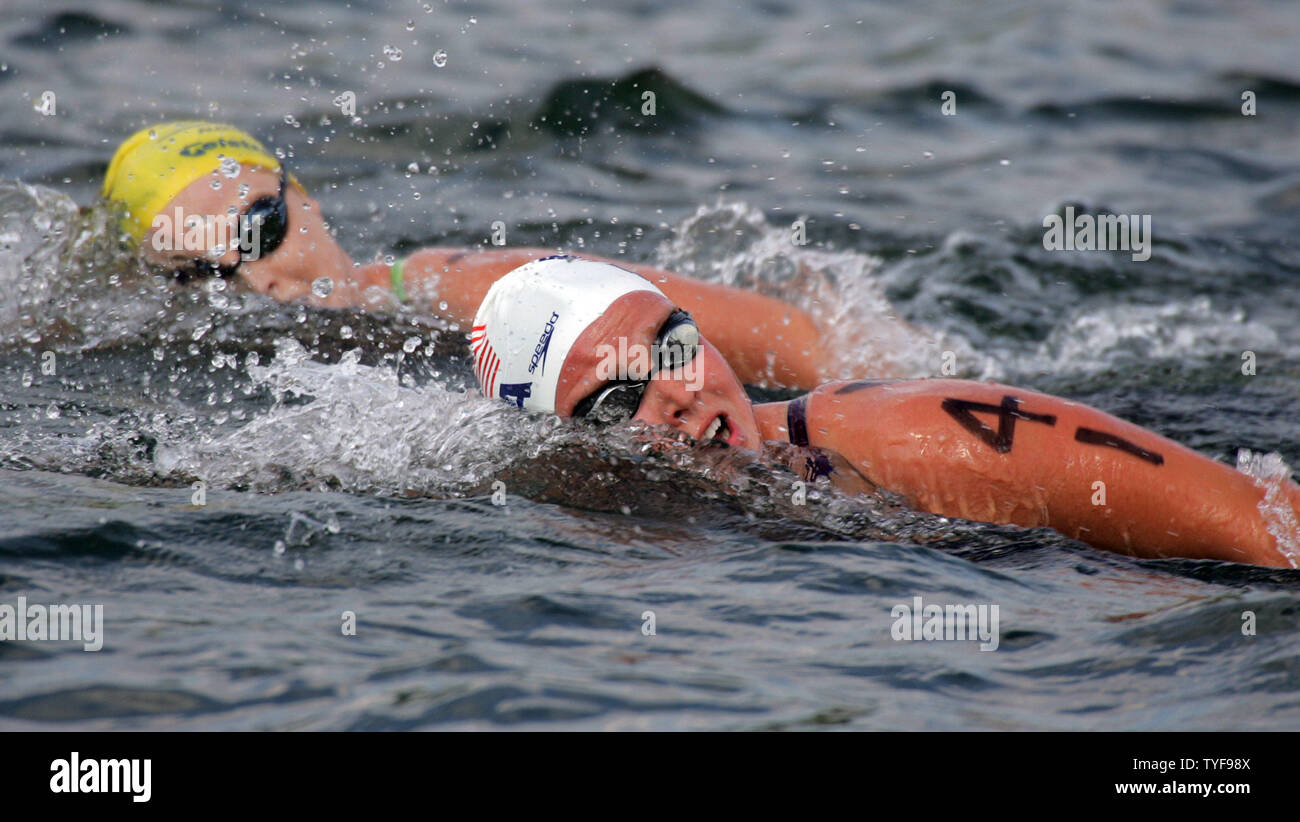 Distance swimmers Erica Rose of the United States (right) and Lauren Arndt of Australia (left)  fight to reach the front peloton in the first of ten laps in the women's 25 km open water race in the basin of St. Helen Island at the XI FINA World Championships in Montreal, Canada on July 22, 2005.  (UPI Photo / Grace Chiu) Stock Photo