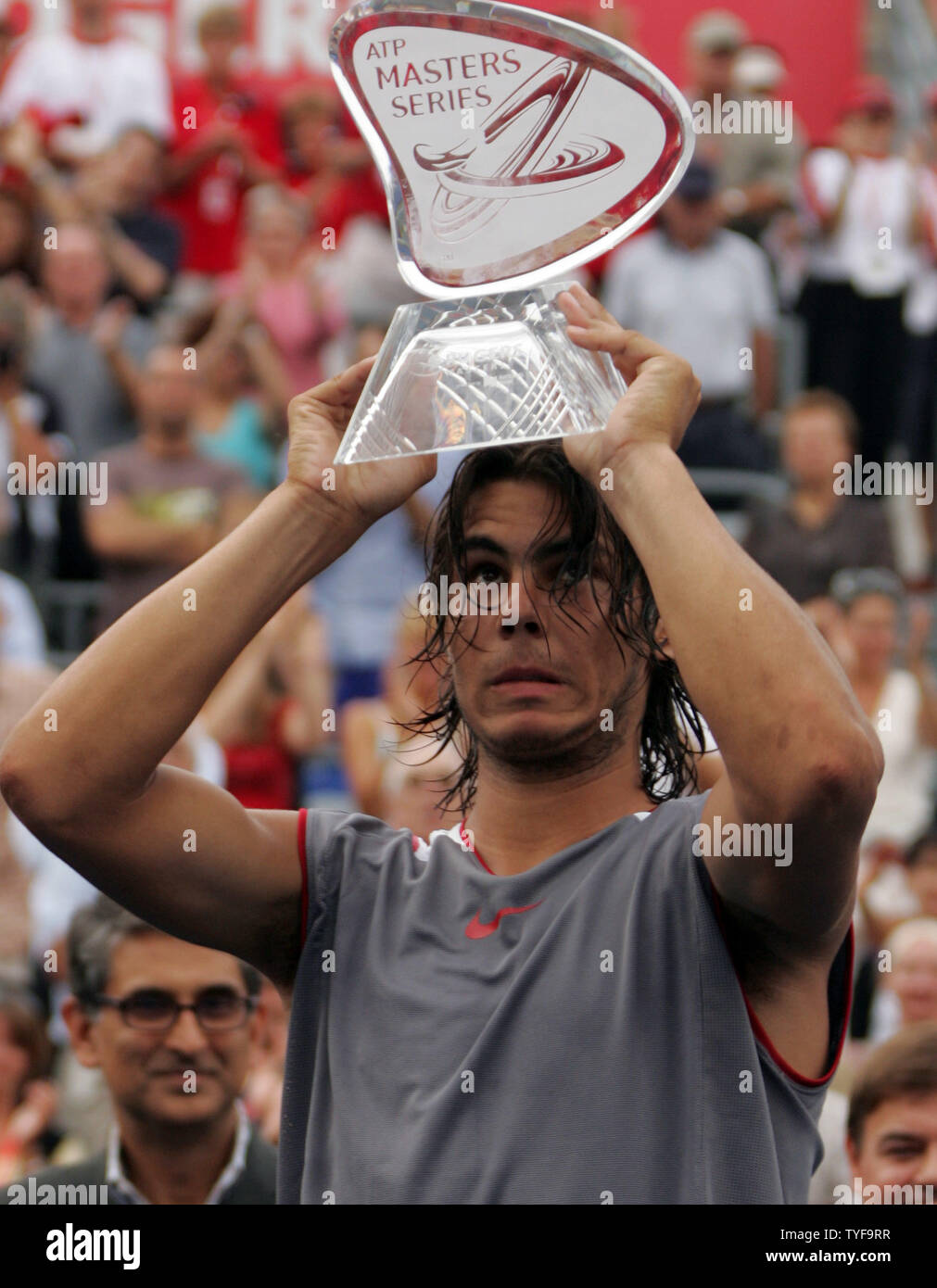 Spain's Rafael Nadal hoists his trophy after winning the Rogers Cup men's tennis  ATP masters series tournament in Montreal on August 14, 2005. Nadal,19, won  the final match against American Andre Agassi