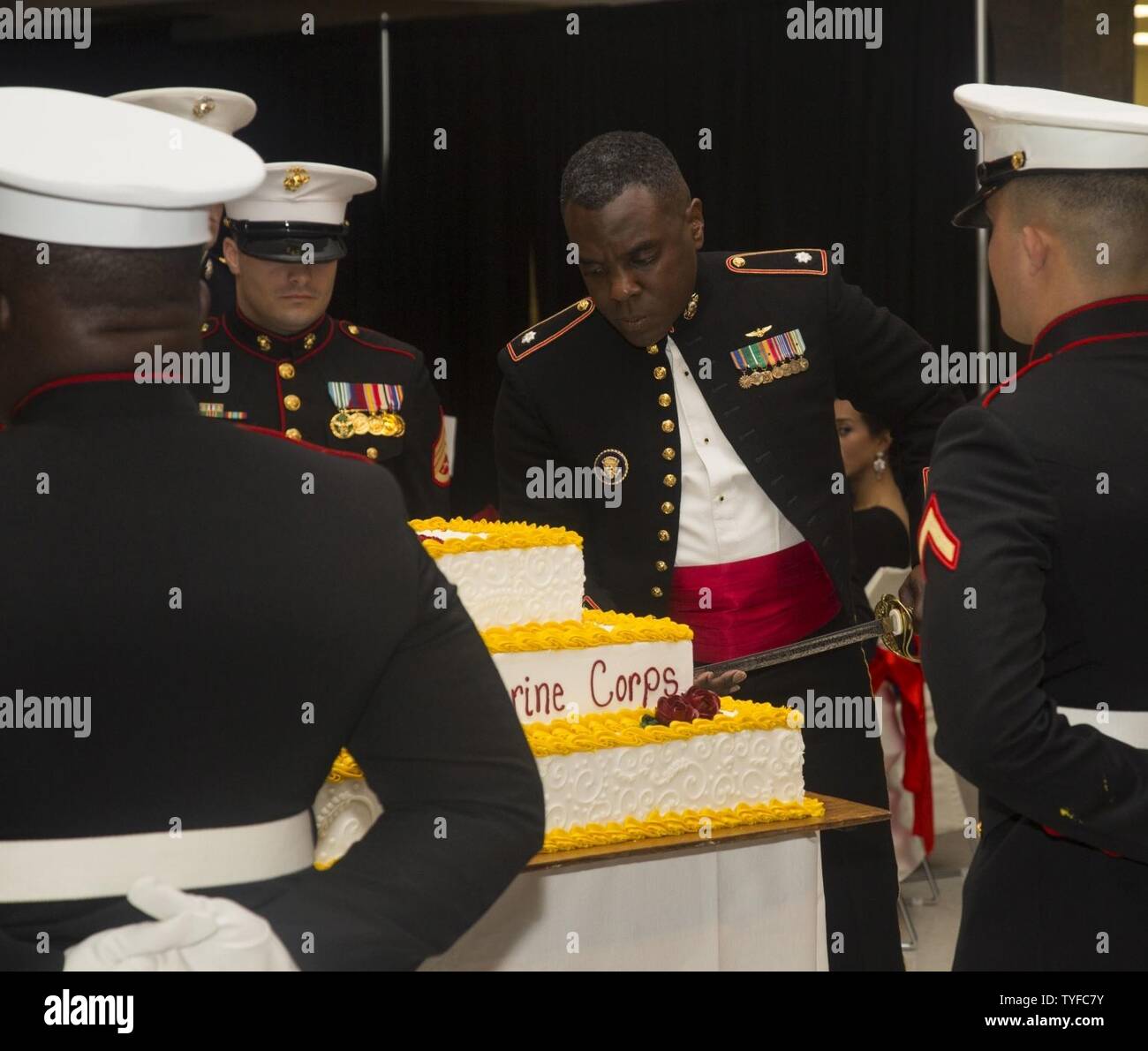 U.S. Marine Corps Lt. Col. Quentin Vaughn, commanding officer, Headquarters and Headquarters Squadron (H&HS), cuts the Marine Corps birthday cake during the H&HS Marine Corps Air Station New River 241st Marine Corps Birthday Ball at the Crystal Coast Civic Center, Morehead City, N.C., Nov. 5, 2016. The Marine Corps has carried 241 years of traditions, values and standards since its establishment in 1775. Stock Photo