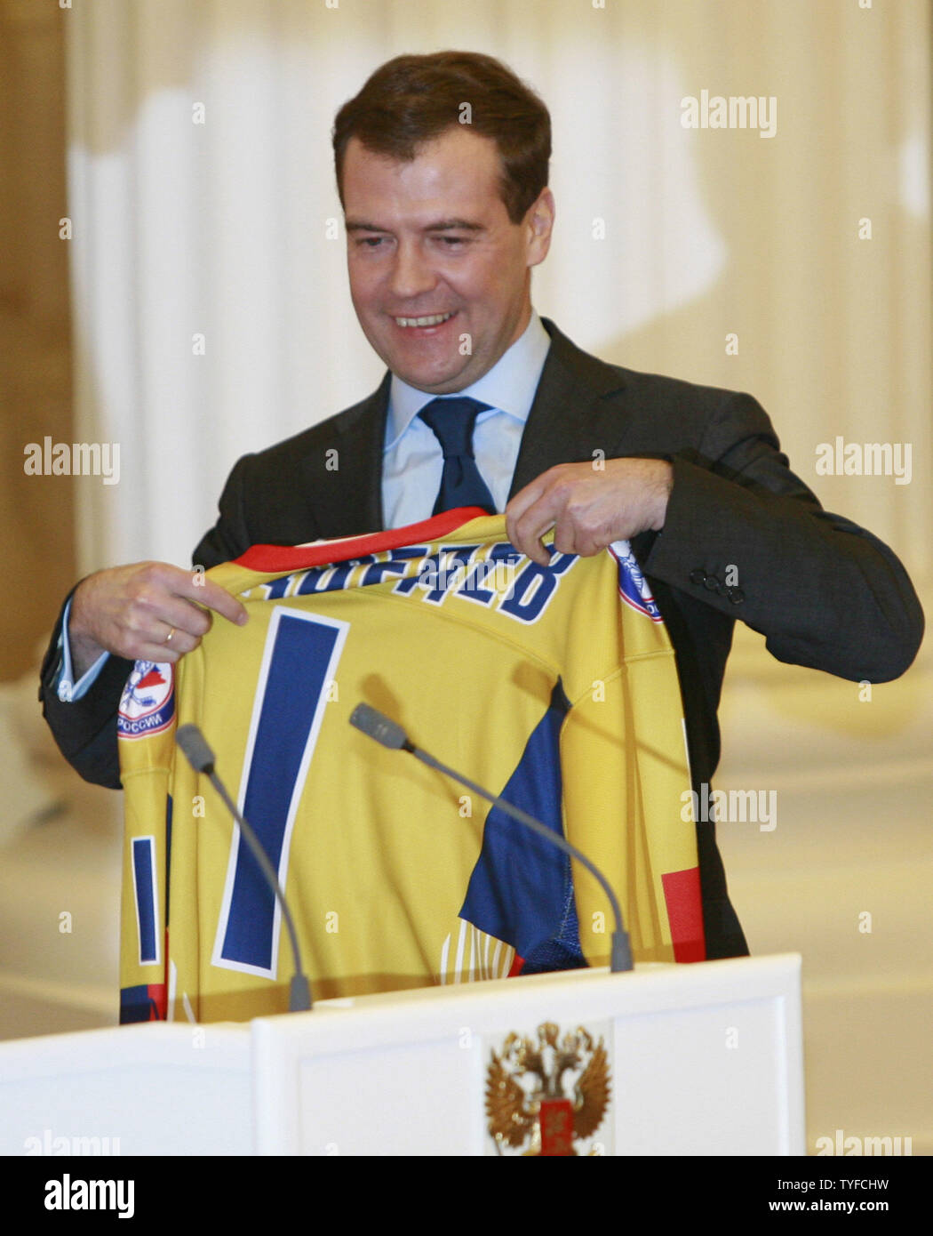 Russian President Dmitry Medvedev receives the hockey team's uniform with players' signatures during a meeting with the national ice hockey team, winner of the IIHF World Hockey Championship, in the Kremlin in Moscow on May 20, 2008. (UPI Photo/Anatoli Zhdanov) Stock Photo