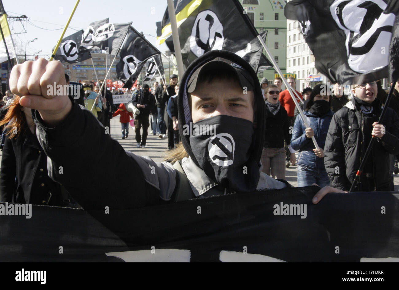 Demonstrators make the Nazi salute and wave flags of the banned National  Bolshevik party during a traditional demonstration to mark May Day in  Moscow on May 1, 2009. (UPI Photo/Anatoli Zhdanov Stock