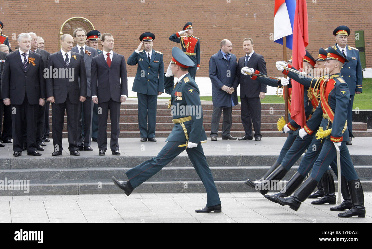 Russian President Dmitry Medvedev (3nd L) and Prime Minister Vladimir Putin (2nd L) review the troops during a wreath laying ceremony at the Tomb of the Unknown Soldier in Moscow on May 8, 2009 on the eve of the Victory Day. On Saturday, May 9 Russia will celebrate the 64th anniversary of the World War Two victory over Nazi Germany. (UPI Photo/Anatoli Zhdanov) Stock Photo
