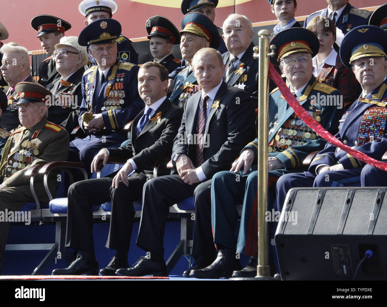 Russian President Dmitry Medvedev (3rd L) and Prime Minister Vladimir Putin (C) attend the Victory Day military parade in Red Square in Moscow on May 9, 2009. Today Russia celebrates the 64th anniversary of the World War Two victory over Nazi Germany. (UPI Photo/Anatoli Zhdanov) Stock Photo
