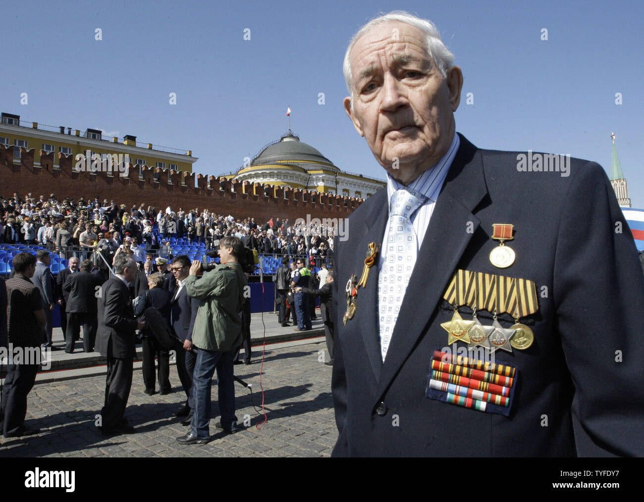 A Russian World War II veteran walks after the Victory Day military ...