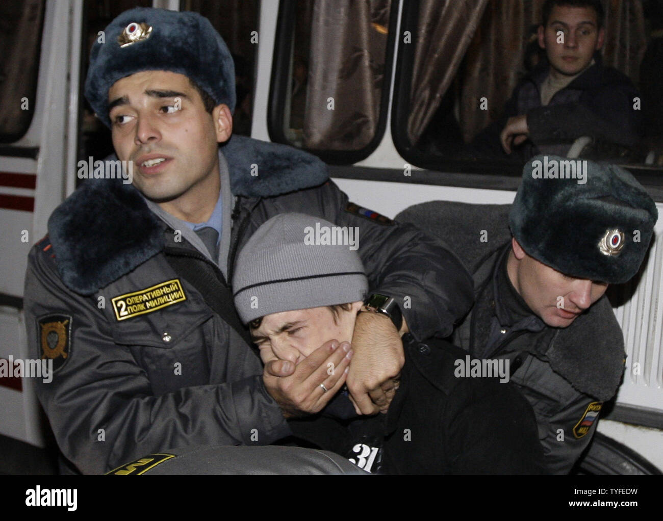 Russian riot police detain an opposition activist during an unauthorised rally in Moscow demanding freedom of assembly on October 31, 2009. UPI/Anatoli Zhdanov Stock Photo